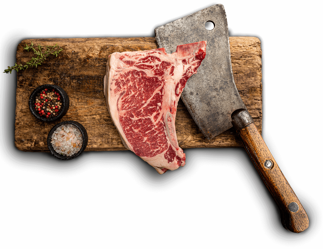 a premium t-bone steak on wooden board at Liam's Quality Meats